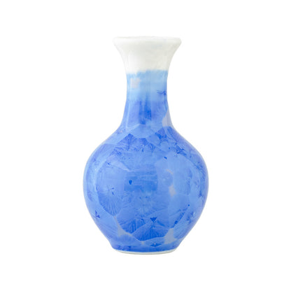 Blue and white ceramic vase on a white background