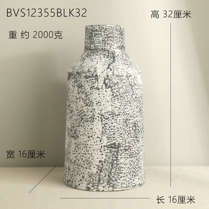 Textured vase with dimensions and weight information on a neutral background