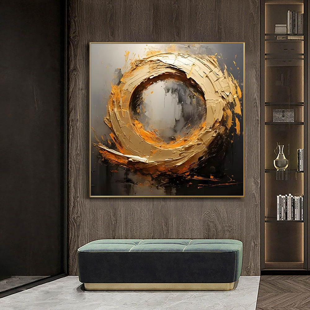 Abstract art piece on a wall above a bench in a modern interior setting