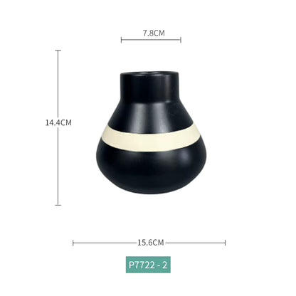 Black vase with a white band and measurements on a white background
