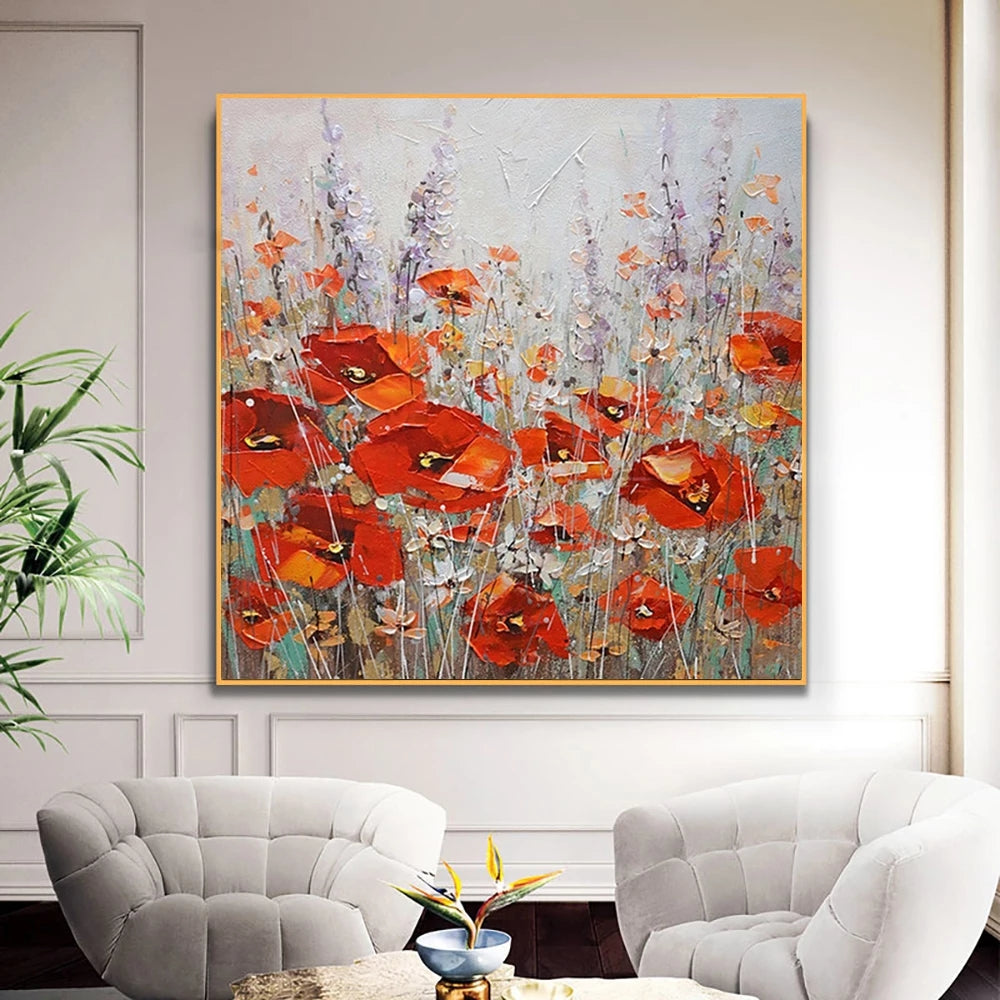 Abstract painting of red flowers in a living room setting