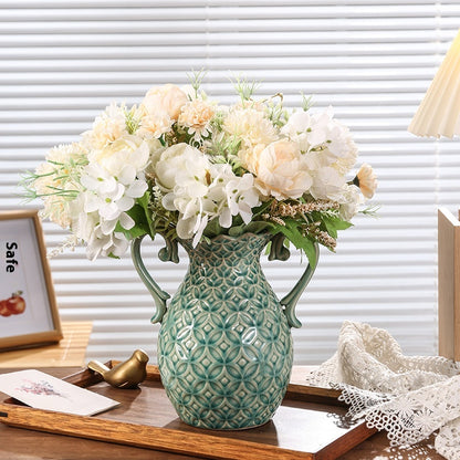 Decorative vase with flowers on a table
