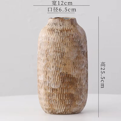 Textured ceramic vase with dimensions on a light gray background
