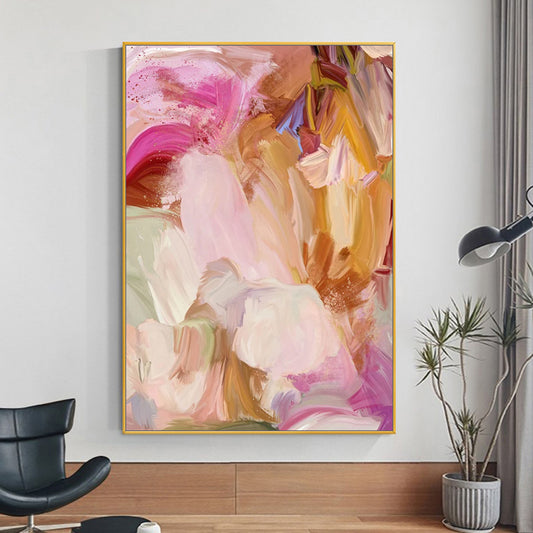 Abstract art painting in a modern interior setting with a chair and plant.