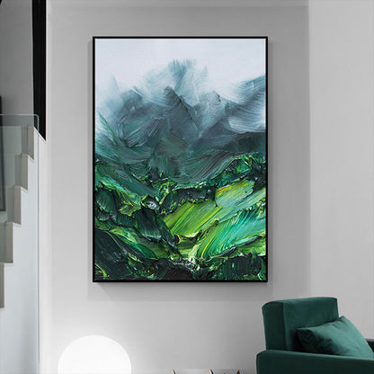 Abstract painting with green and blue tones in a modern interior setting.