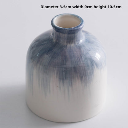 White vase with blue gradient on a white background