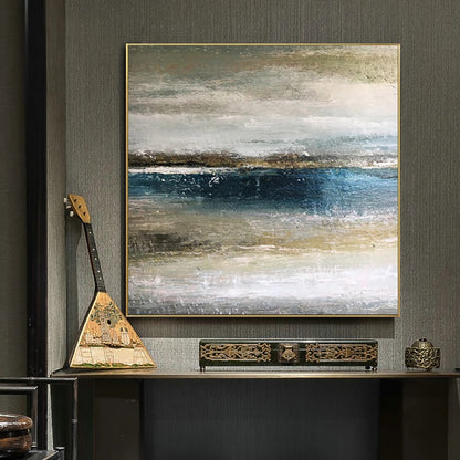 Abstract painting on a wall with decorative items below