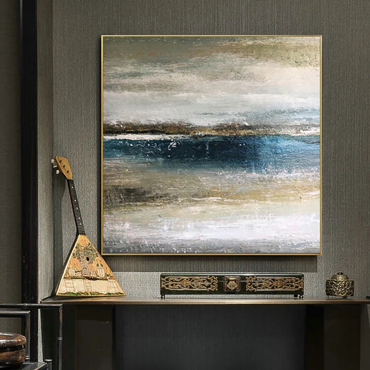 Abstract painting on a wall with decorative items below