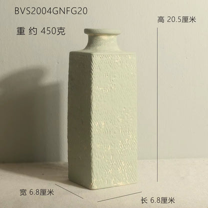 Textured square vase on a neutral background with measurements