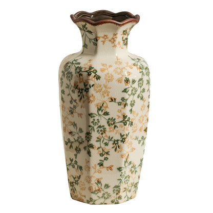 Decorative vase with floral pattern on a white background