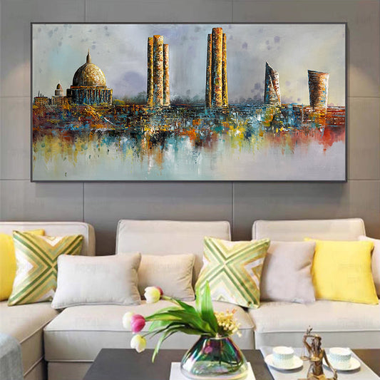 Colorful abstract cityscape painting on a wall above a sofa with decorative pillows.