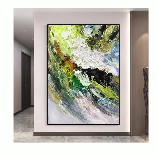 Abstract painting with vibrant colors on a wall in a modern interior setting