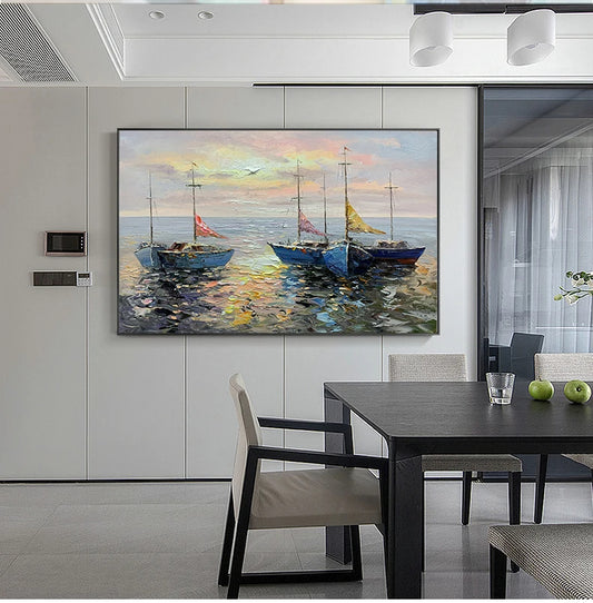 Dining room with a large painting of sailboats on the wall