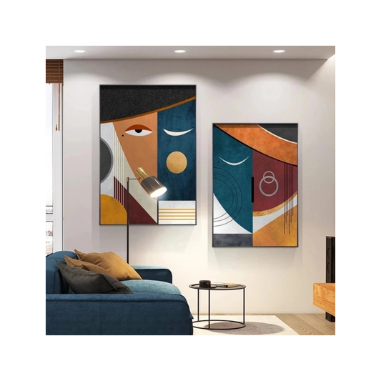 Modern living room with abstract wall art and a blue sofa.