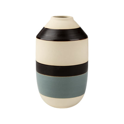 Decorative vase with black and beige stripes on a white background