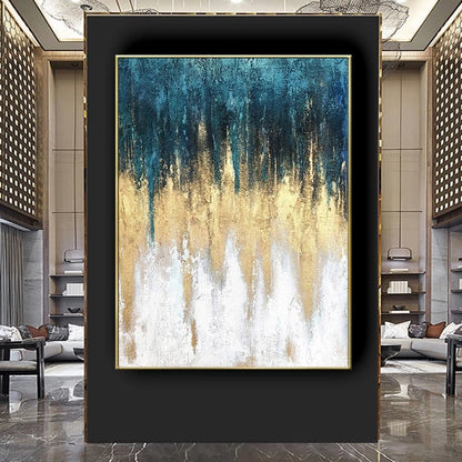 Abstract art painting with blue, gold, and white colors in a modern interior setting.