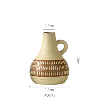 Beige ceramic vase with brown patterns and measurements on a white background