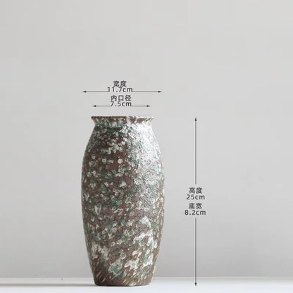 Decorative vase with measurement markings on a white background