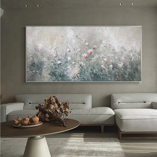 Living room with a large abstract painting on the wall above a sofa.