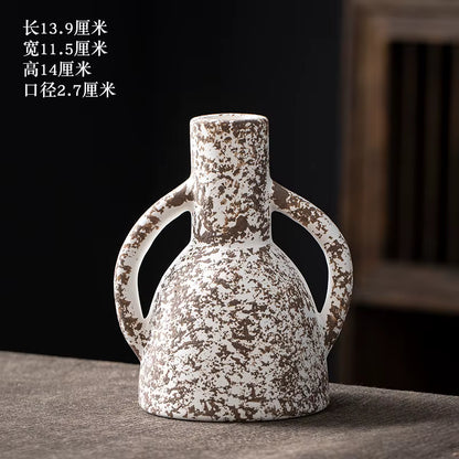 Ceramic vase with textured surface on a dark background