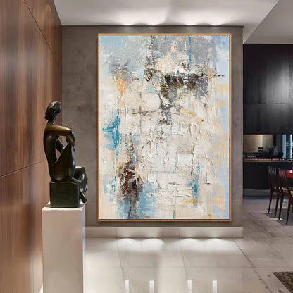 Abstract painting in a modern interior setting with a sculpture on a pedestal.