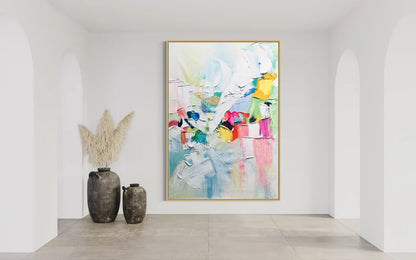 Abstract painting in a modern interior setting with decorative vases.