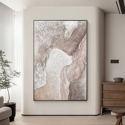 Abstract art piece on a wall in a modern living room