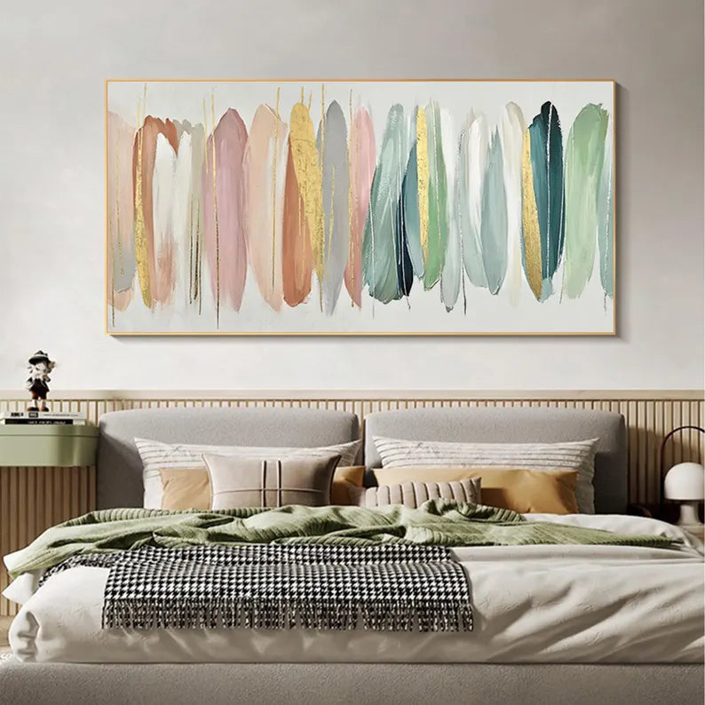 Modern bedroom with abstract art above a bed