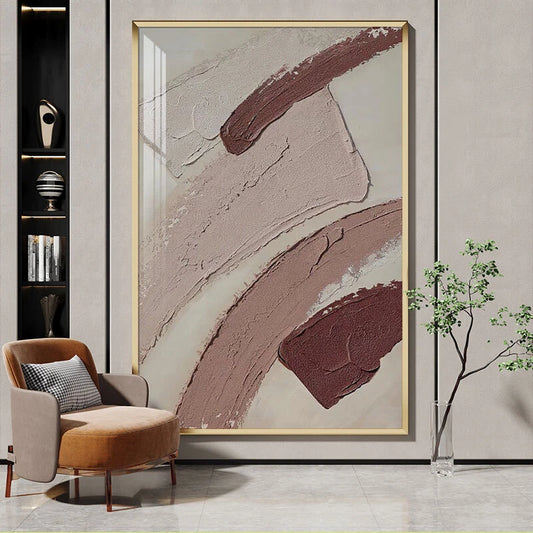 Abstract art piece in a modern living room setting with a chair and plant.